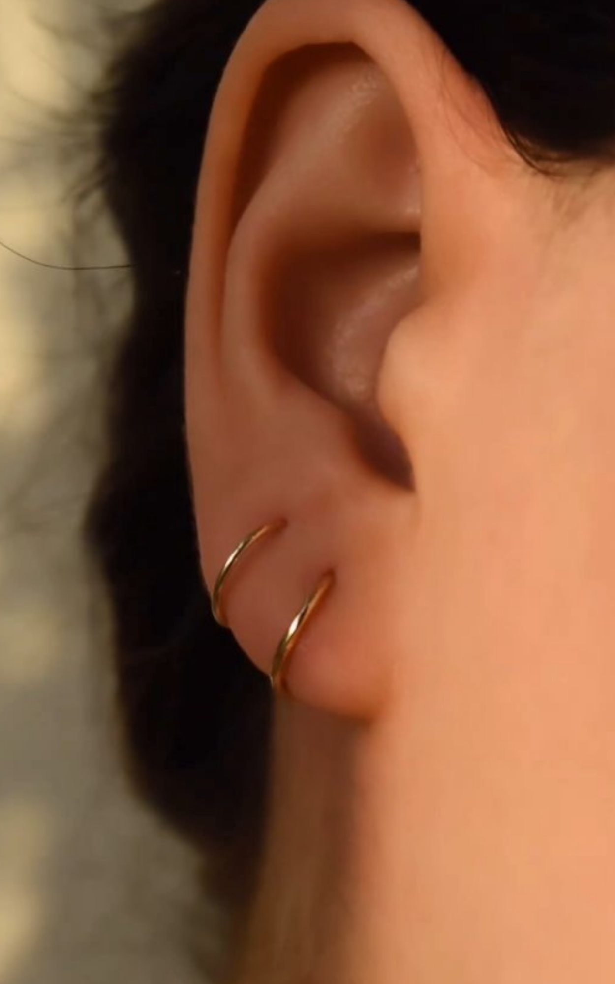 Dual piercing mini hoops